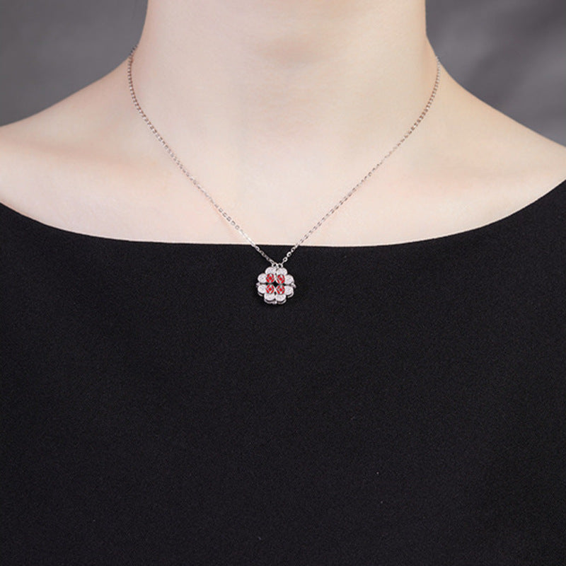 Original model wearing the necklace in its closed clover form