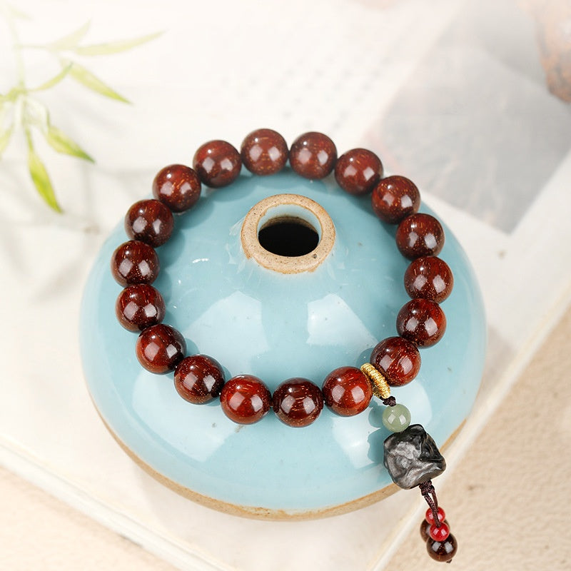 Silver Obsidian Lion Dance Head Sandalwood Bracelet-Grounded Resolve