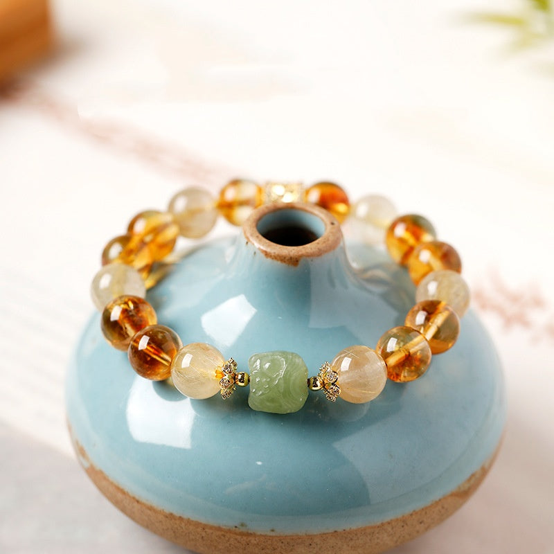 Confidence in Motion-Golden Rutilated Quartz Lion Bracelet