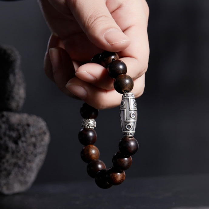 Nine-Eyed Dzi Rosewood Bracelet-Grounded Wisdom