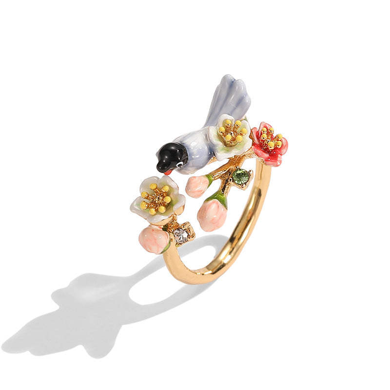 Joyous Sentinel Bird & Blossom Ring
