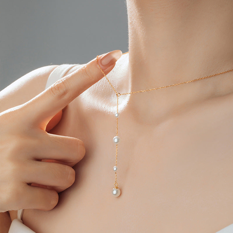 Pearl Y Necklace-A Delicate Trail of Light