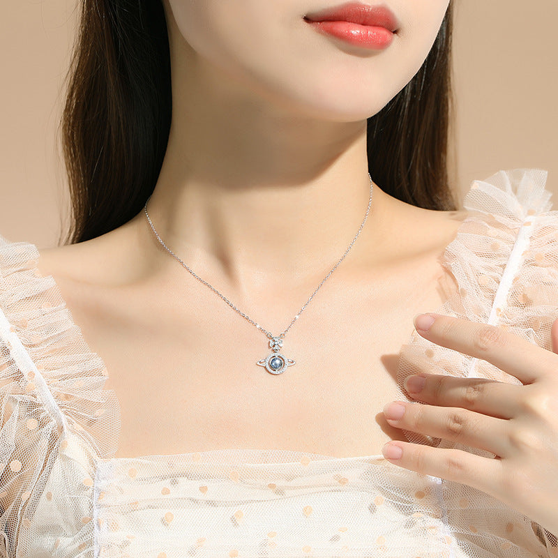 Love Across the Distance-Saturn and Cross Sterling Silver Necklace