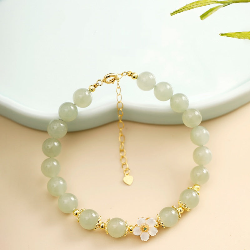 Peach Blossom Hetian Jade Bracelet-Tender Connection