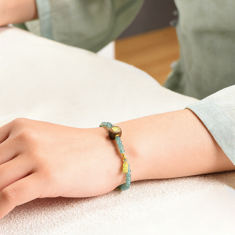 Ice Jade & Agarwood Harmony Bracelet-Whispers of Zen