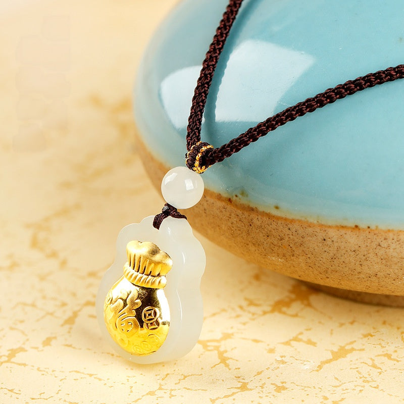 White nephrite fortune pouch necklace with a blue ceramic accent
