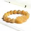 Wealth Guarding Pixiu Golden Silk Jade Bracelet