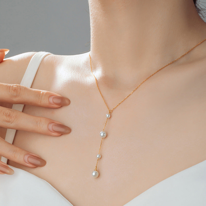 Pearl Y Necklace-A Delicate Trail of Light