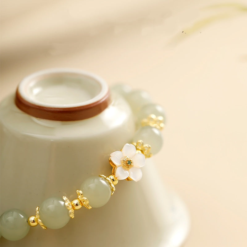 Peach Blossom Hetian Jade Bracelet-Tender Connection