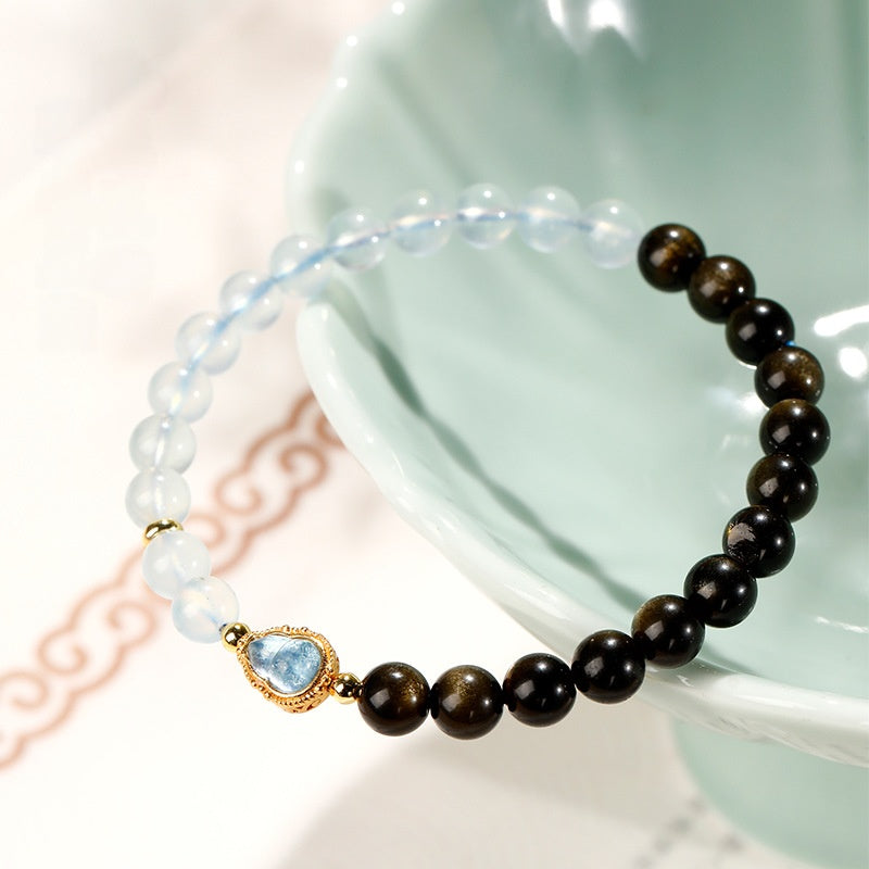 Clarity in Motion-Gold Obsidian Aquamarine Gourd Bracelet