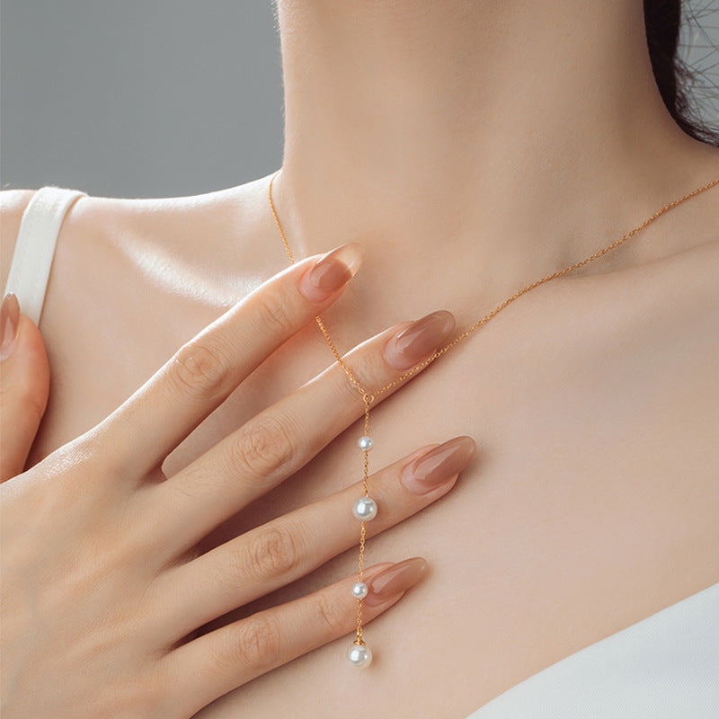 Pearl Y Necklace-A Delicate Trail of Light