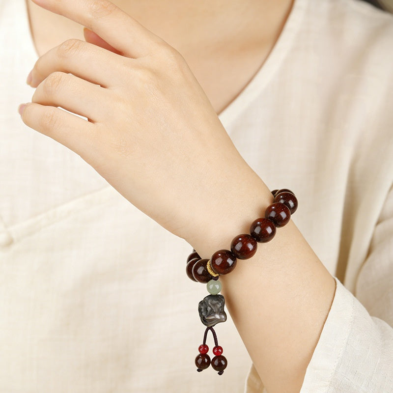 Silver Obsidian Lion Dance Head Sandalwood Bracelet-Grounded Resolve