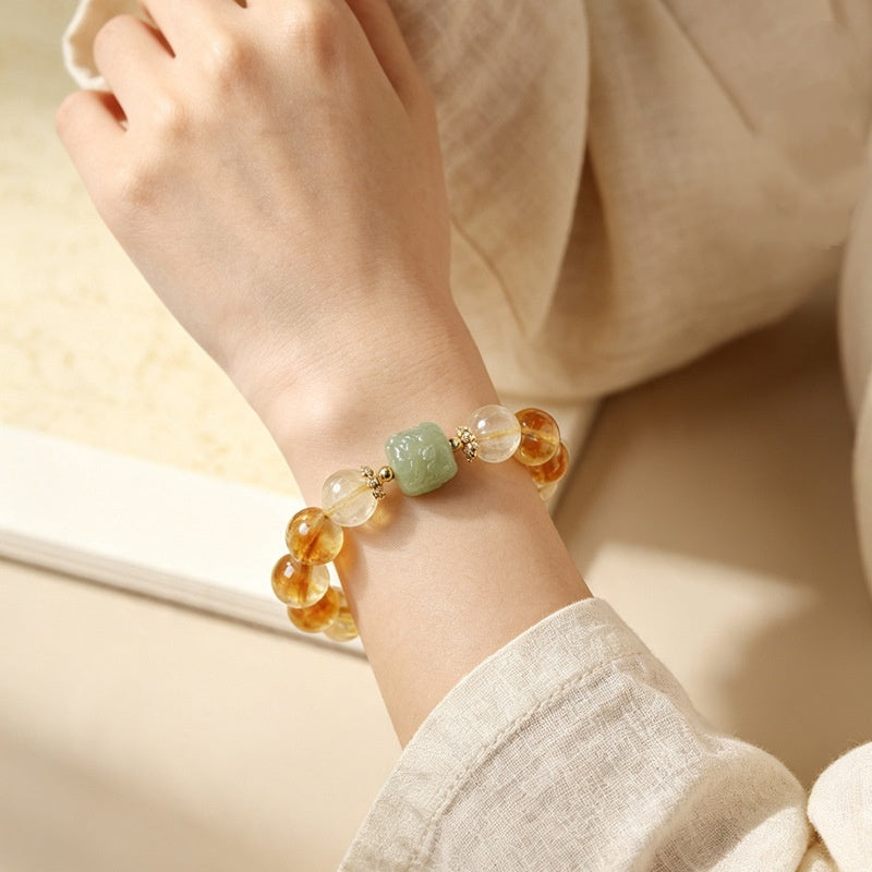 Confidence in Motion-Golden Rutilated Quartz Lion Bracelet