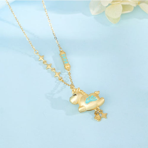 Turquoise and gold pony pendant centered on a delicate chain against a light background