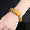Wealth Guarding Pixiu Golden Silk Jade Bracelet