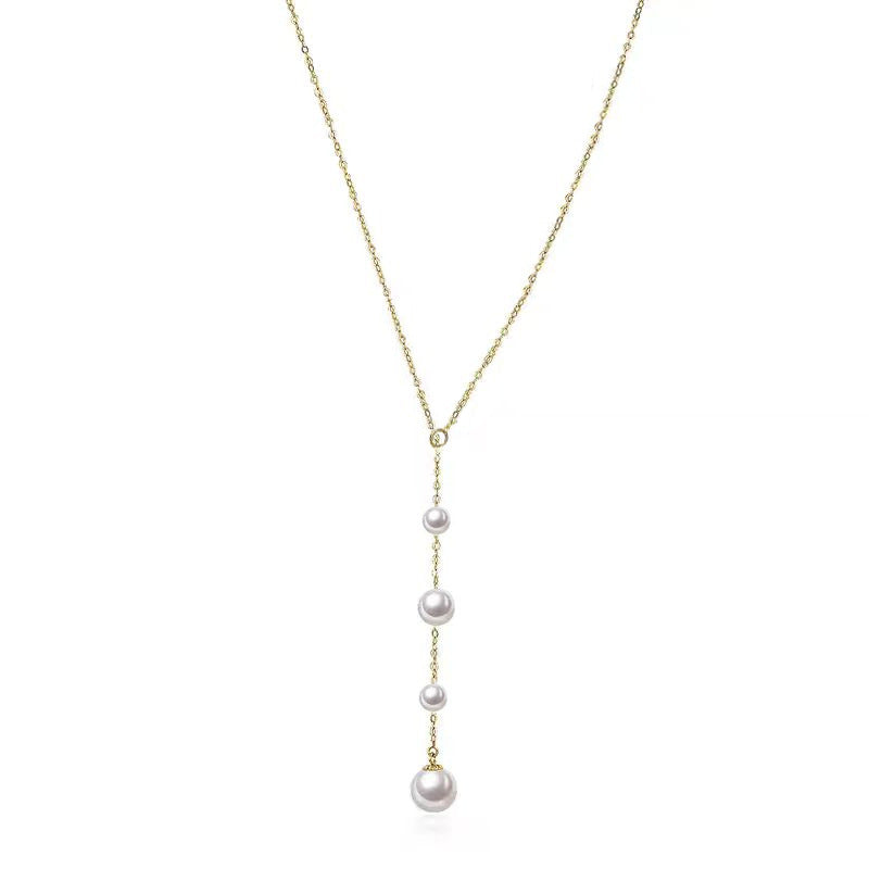 Pearl Y Necklace-A Delicate Trail of Light