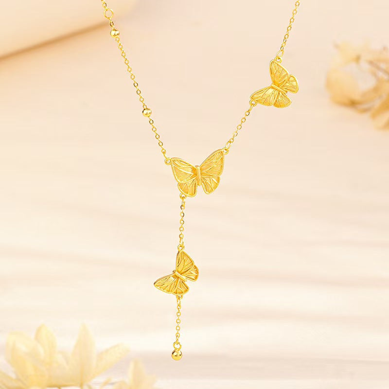 Gold Butterfly Cascade Necklace — Transformation · Lightness · New Beginnings