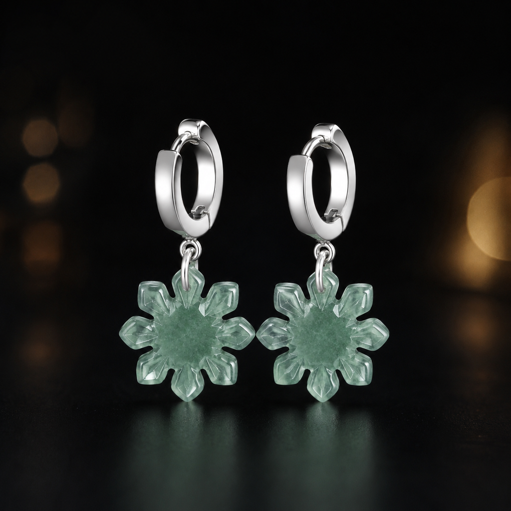 Green jade sunflower earrings with silver hoops displayed against a black background