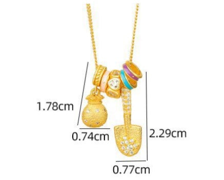 Gold Shovel & Blessing Pouch Necklace – Dig for Joy and Blessings