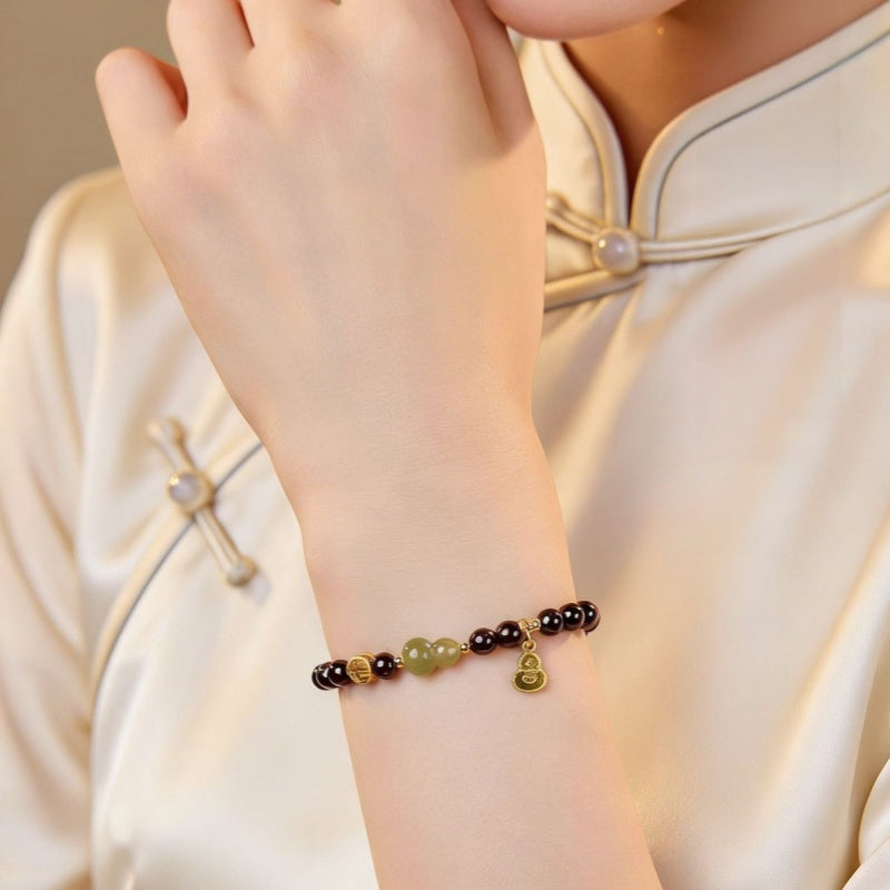 Blessings in Motion-Nephrite Jade Gourd Garnet Bracelet