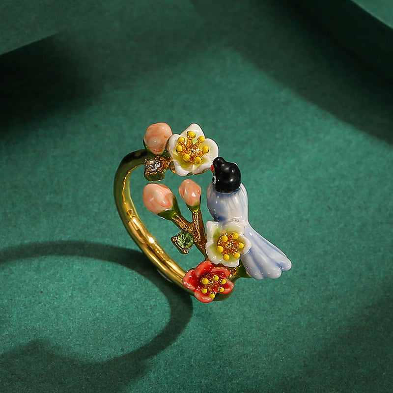 Joyous Sentinel Bird & Blossom Ring
