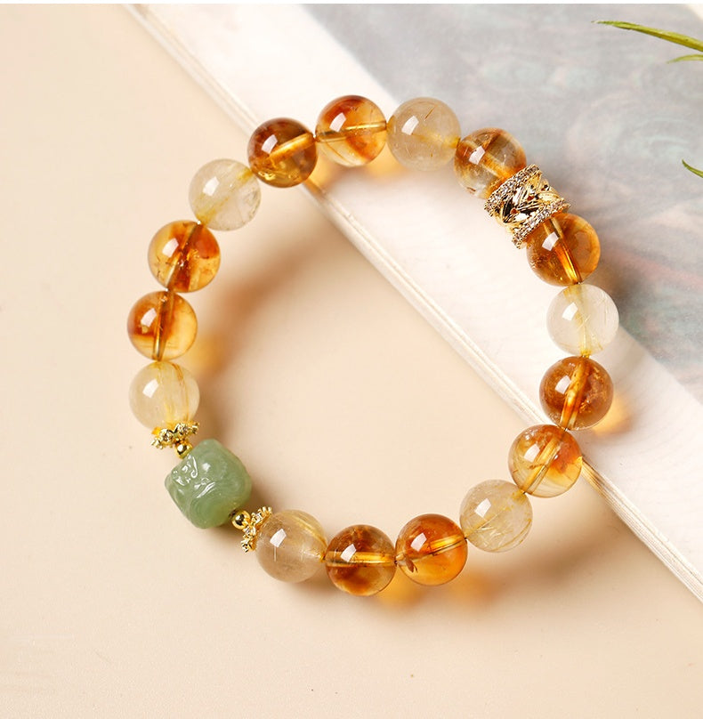 Confidence in Motion-Golden Rutilated Quartz Lion Bracelet