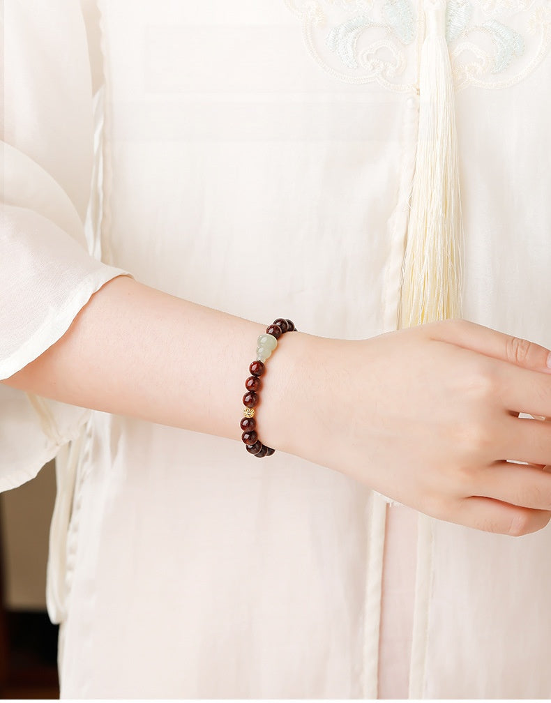 Jadeite Gourd Garnet Bracelet-Fortune in Motion