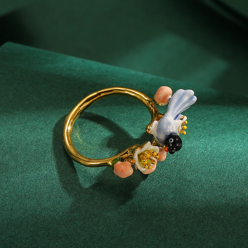 Joyous Sentinel Bird & Blossom Ring