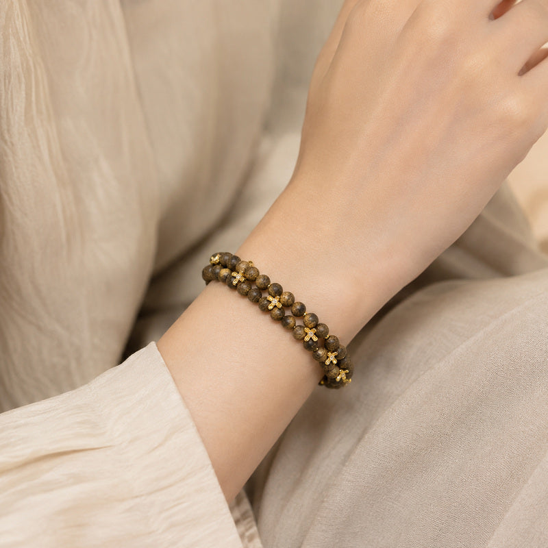 Model wearing the agarwood osmanthus double-row bracelet