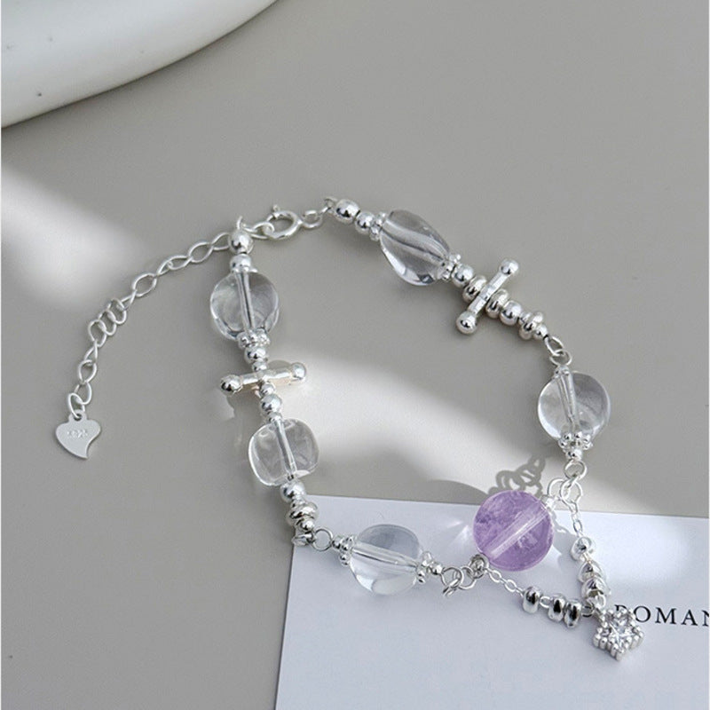 Amethyst bracelet with irregular white crystal beads and star charm