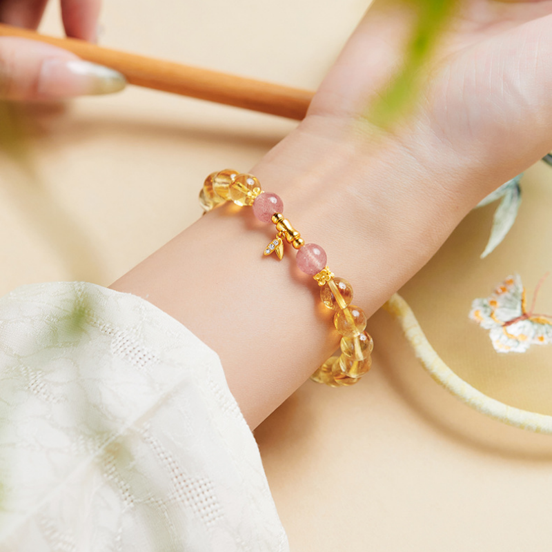 Close view of bamboo motif bracelet worn on the wrist