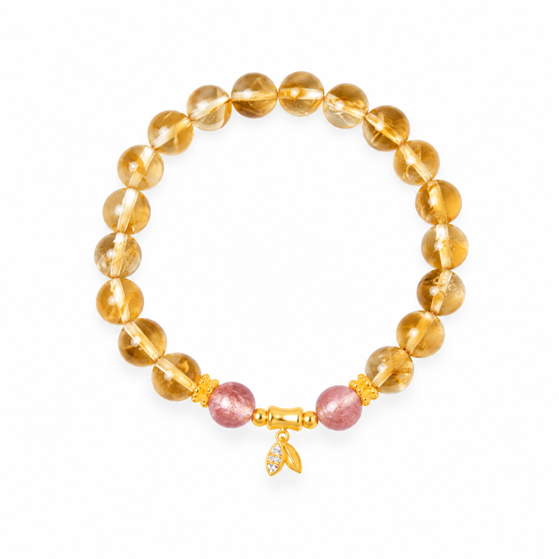 Bamboo citrine and pink bead bracelet isolated on white