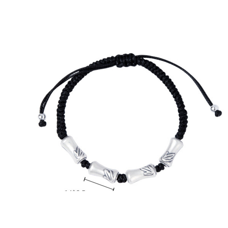 Bamboo 999 fine silver cord bracelet on white background