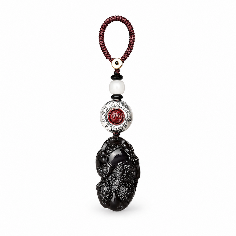 Black obsidian Pixiu car keychain on clean white background