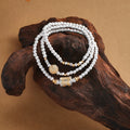 999 fine silver blessing barrel triple wrap bracelet on driftwood
