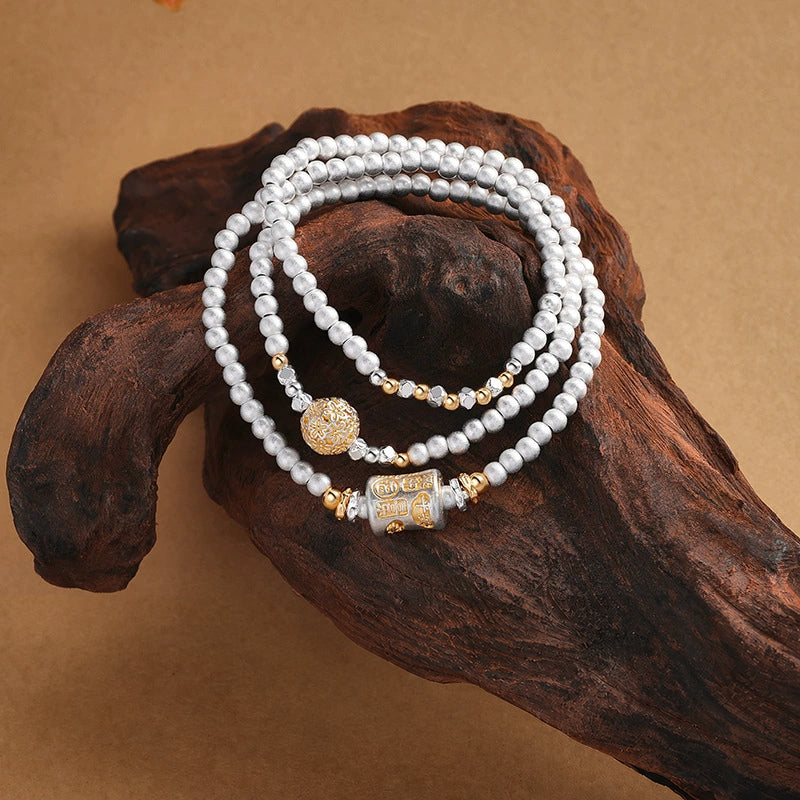 999 fine silver blessing barrel triple wrap bracelet on driftwood
