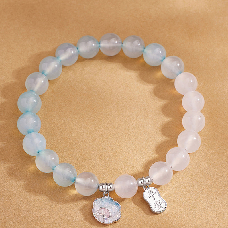 Front view of gradient blue agate white chalcedony bracelet