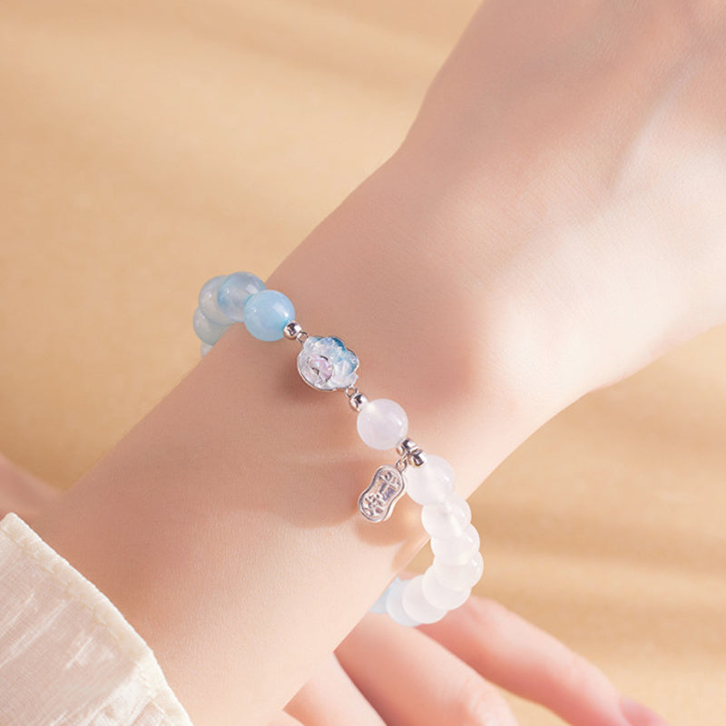 Close wrist view of the iridescent cat paw accent