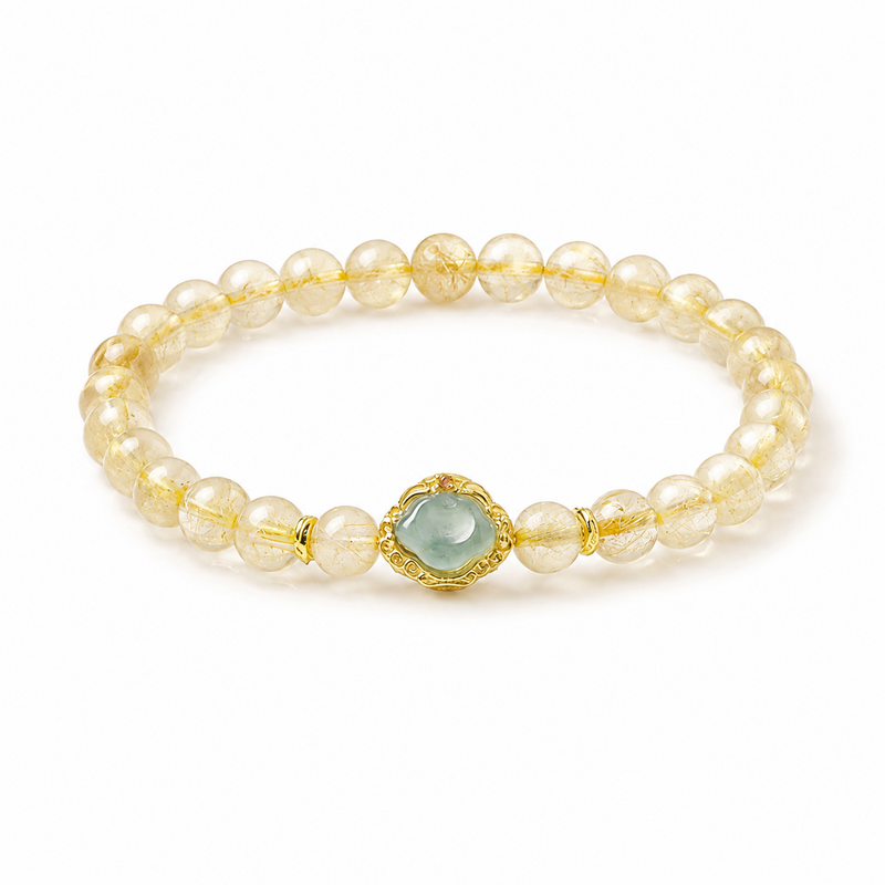 Golden rutilated quartz bracelet with blue-water jadeite cloud on white