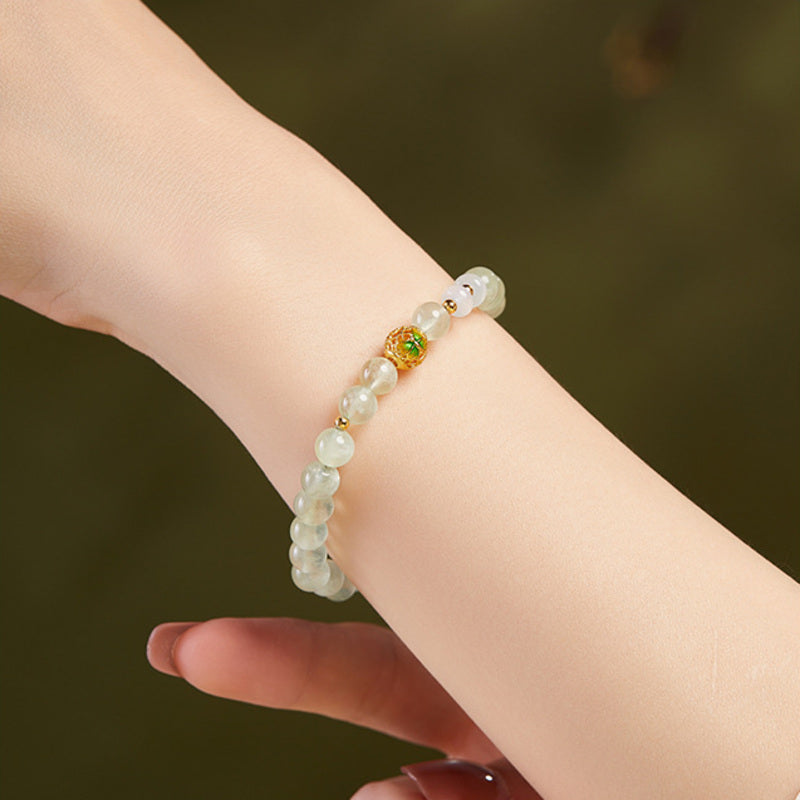 Close model view of the cold enamel butterfly prehnite bracelet
