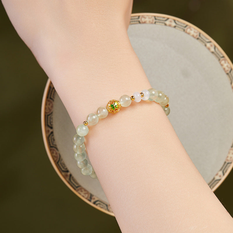 Cold enamel butterfly prehnite bracelet worn on the wrist