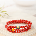 Cinnabar jadeite triple-wrap bracelet in supplier presentation