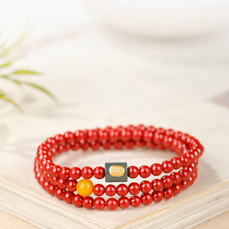Cinnabar jadeite triple-wrap bracelet in supplier presentation