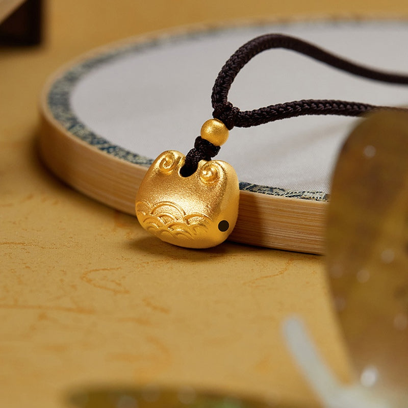 Oblique view of the rounded peace lock pendant and braided cord