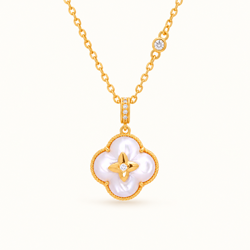 Mother-of-pearl clover necklace on white background
