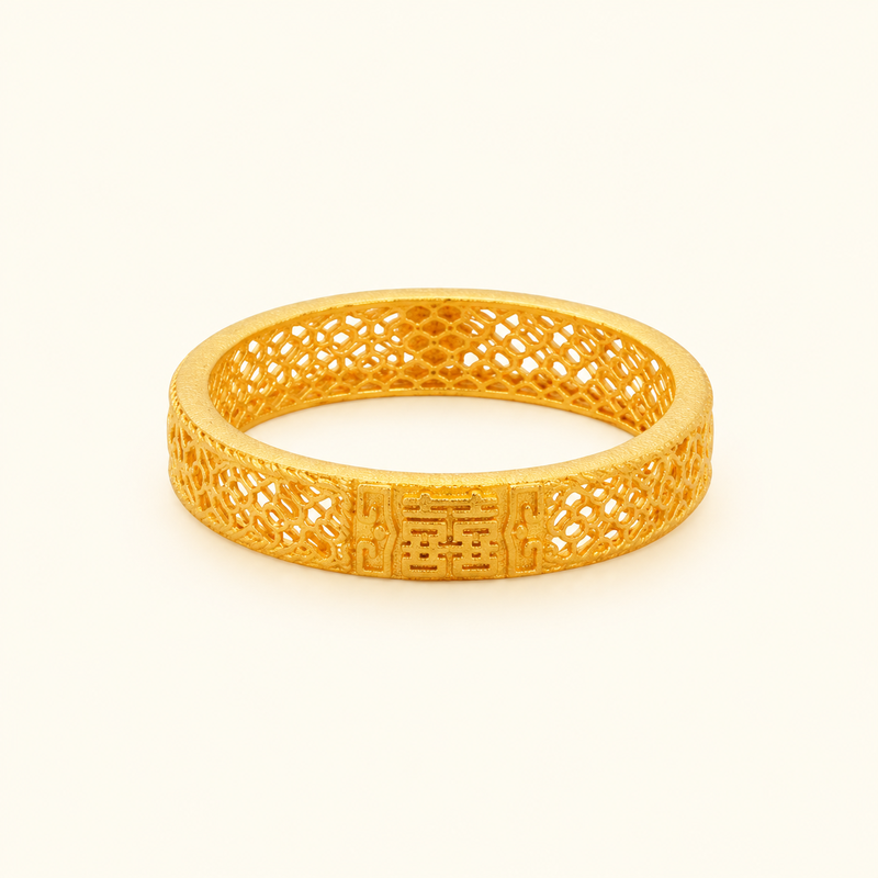 Double Happiness filigree ring on a pale background