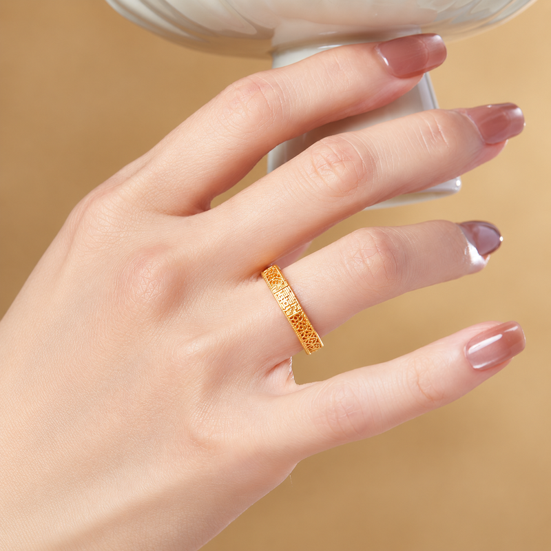 Original model wearing the ring while holding a bowl