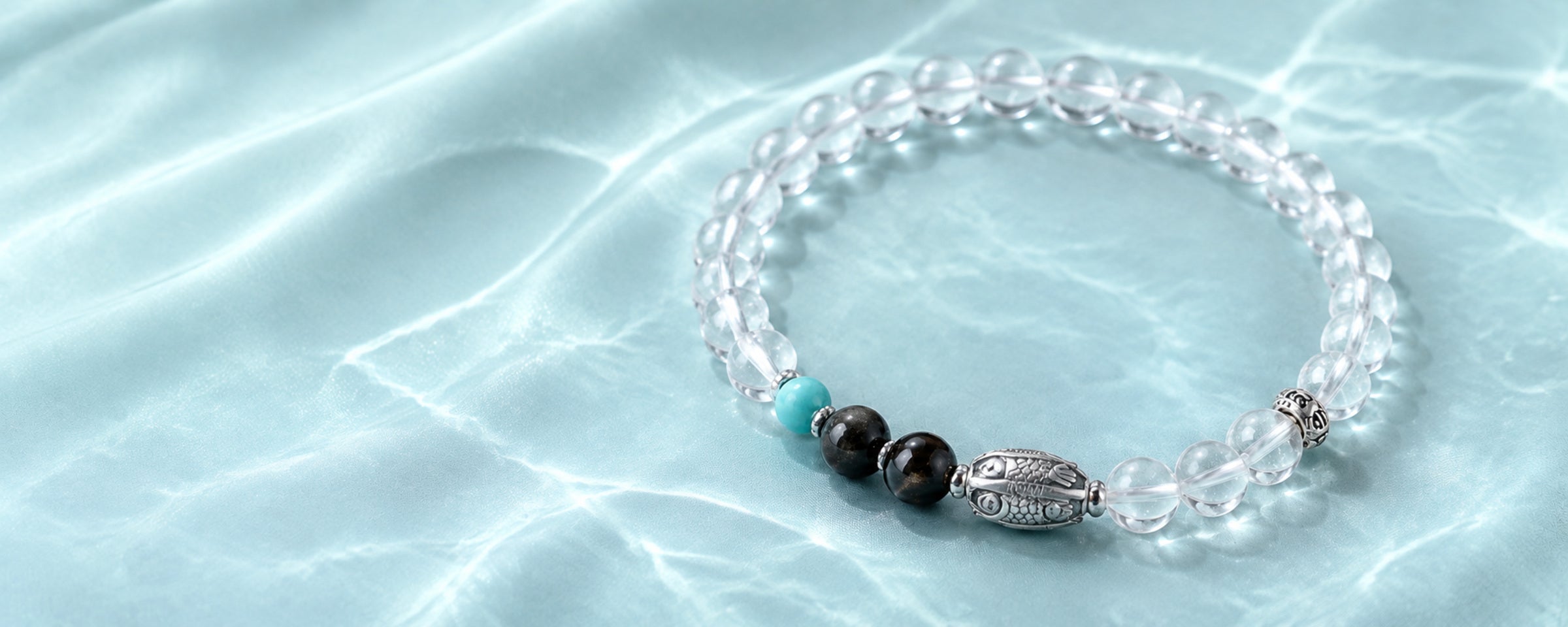 Flow Forward silver koi clear quartz bracelet desktop hero