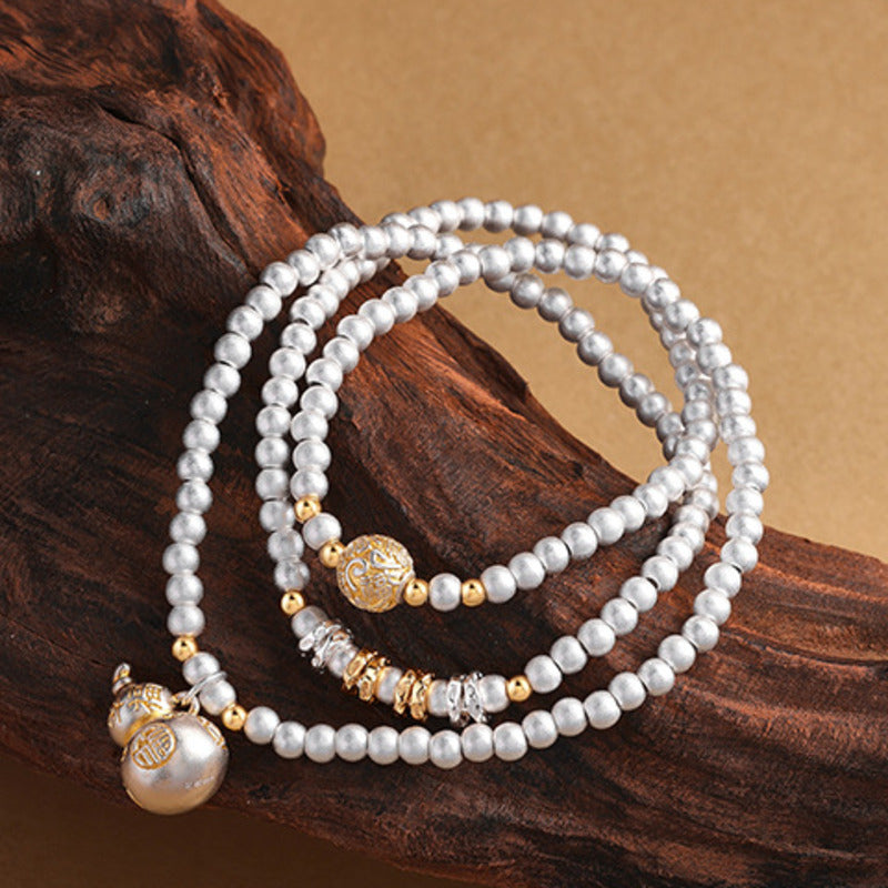 999 fine silver gourd bracelet on dark wood