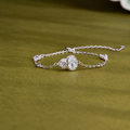 925 silver gourd bracelet on olive green fabric